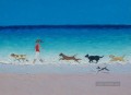 Mädchen mit Hunde am Strand laufen
